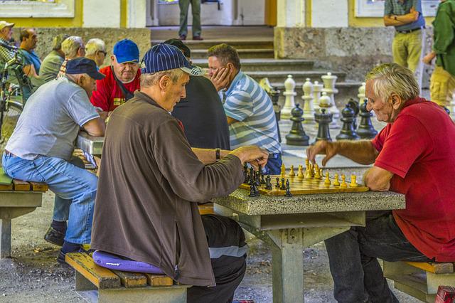 Elderly programmers playing Chess