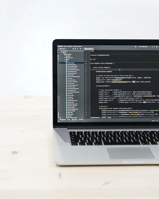 A laptop with written programming codes