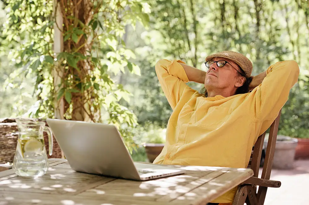 Old Male Rich Programmer at his backyard