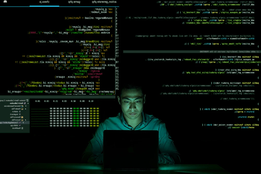 A Programmer coding in the dark